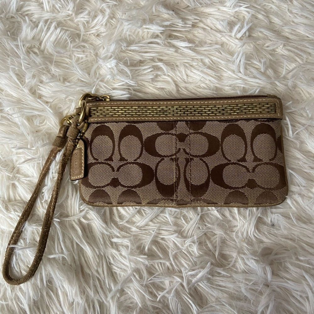 Coach wristlet with beaded detail